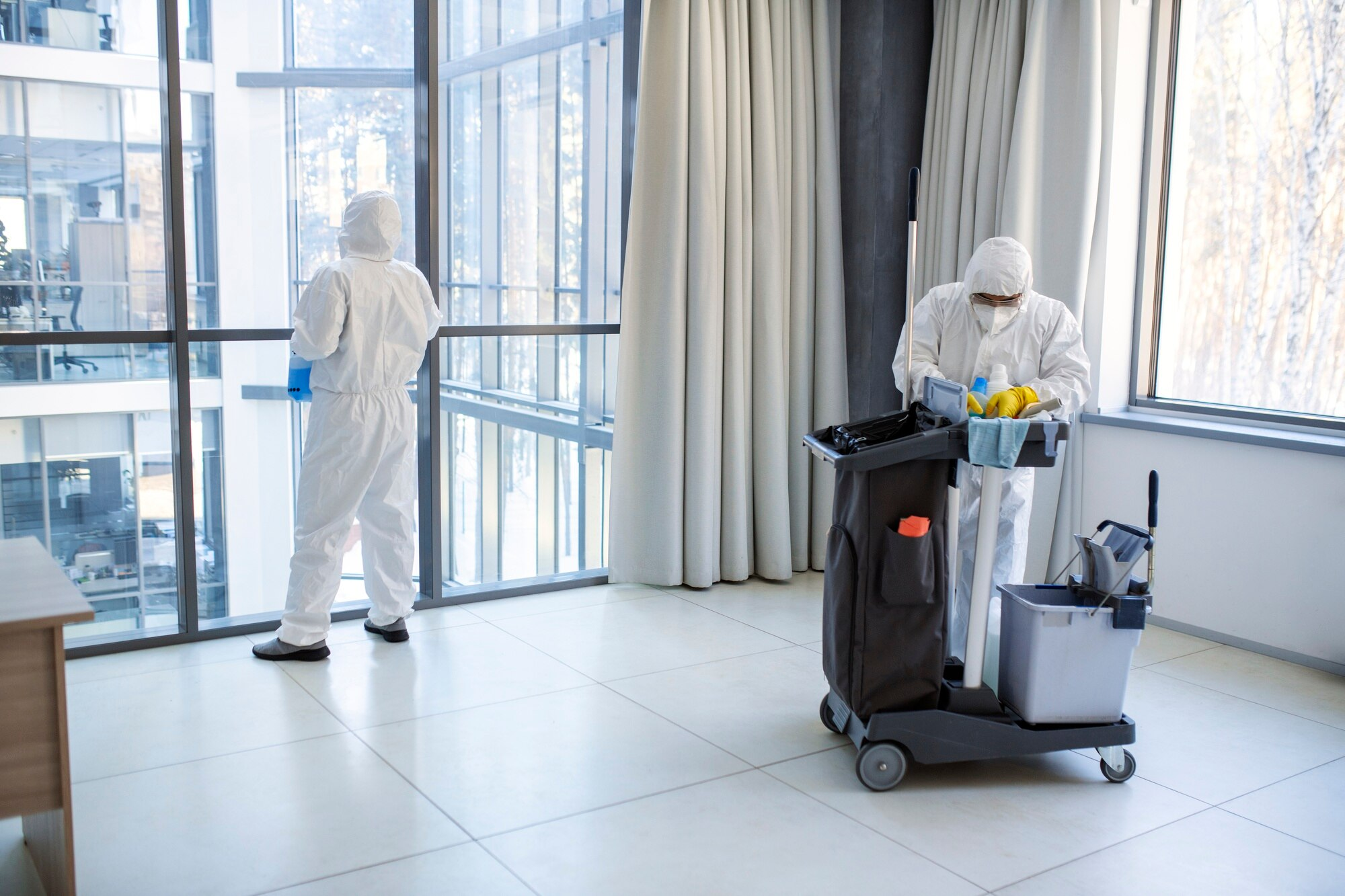 Professional cleaner in protective equipment